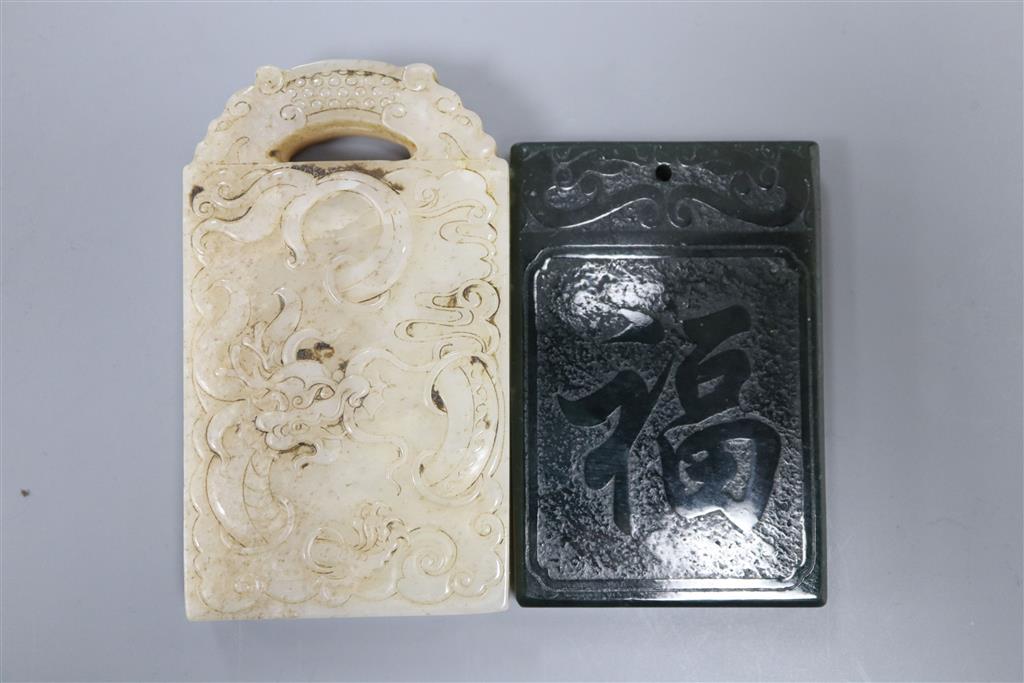 A Chinese white and russet jade dragon plaque and a spinach green jade plaque, 6.2 - 7.3cm